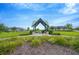Outdoor gazebo with seating provides a relaxing space to enjoy community amenities in a landscaped setting at 11464 Chilly Water Ct, Riverview, FL 33569