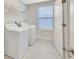 Laundry room with a white washer and dryer, and tile floors at 11464 Chilly Water Ct, Riverview, FL 33569