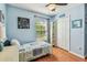Relaxing bedroom with a window, and closet offering ample storage space at 12413 Dawn Vista Dr, Riverview, FL 33578