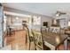 Open concept dining area showcasing an adjacent kitchen at 12413 Dawn Vista Dr, Riverview, FL 33578