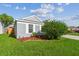 Charming single-Gathering home with a well-maintained lawn and colorful landscaping at 12413 Dawn Vista Dr, Riverview, FL 33578