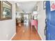Inviting foyer with wood floors leading into the home's open living spaces at 12413 Dawn Vista Dr, Riverview, FL 33578