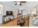 Open living room with hardwood floors and an open concept layout at 12413 Dawn Vista Dr, Riverview, FL 33578