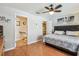 Cozy main bedroom showing en-suite bathroom and walk-in closet at 12413 Dawn Vista Dr, Riverview, FL 33578