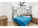 Cozy bedroom with natural light, ceiling fan, and coordinated furniture for a relaxing atmosphere at 1275 Palm St, Clearwater, FL 33755