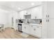 Bright and modern kitchen showcasing white cabinetry and a sleek, functional design at 1275 Palm St, Clearwater, FL 33755