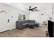 Bright living room with contemporary furnishings and easy access to adjacent rooms at 1275 Palm St, Clearwater, FL 33755