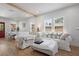 Cozy living room featuring hardwood floors, abundant natural light, and comfortable seating at 1435 Prescott S St, St Petersburg, FL 33712