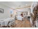 Bright, open-concept living area with hardwood floors and modern design elements at 1435 Prescott S St, St Petersburg, FL 33712