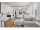 Comfortable living room featuring hardwood floors, neutral tones, and natural light at 1435 Prescott S St, St Petersburg, FL 33712