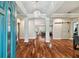 Elegant foyer featuring hardwood floors, high ceilings, and an open floor plan at 15217 Octavia Ln, Odessa, FL 33556