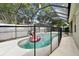 Inviting screened-in pool area with -safe fencing and a refreshing pool at 15217 Octavia Ln, Odessa, FL 33556