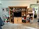 Well-lit entertainment area with shelves for storage and decor at 1605 Logan St, Clearwater, FL 33755
