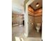 Well-lit bathroom with a glass shower, toilet, and neutral tile flooring at 19636 Long Lake Ranch Blvd, Lutz, FL 33558