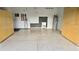 Spacious garage features storage cabinets, utility sink, and clean epoxy floor at 19636 Long Lake Ranch Blvd, Lutz, FL 33558