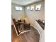 Modern staircase with wood railings and hardwood steps descending to the lower level at 19636 Long Lake Ranch Blvd, Lutz, FL 33558