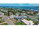 Stunning waterfront community featuring a beautifully maintained home with lush landscaping and a private, fenced-in yard at 2 79Th S St, St Petersburg, FL 33707