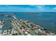 Expansive view showcasing a charming waterfront community with quick access to the open bay and white sand beaches at 2 79Th S St, St Petersburg, FL 33707
