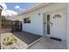 Welcoming front entrance with a modern door and decorative privacy screen at 2 79Th S St, St Petersburg, FL 33707