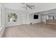 Spacious living room featuring wood-look floors and recessed lighting at 2 79Th S St, St Petersburg, FL 33707
