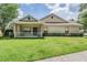 Beautiful home with well maintained lawn and shrubbery at 20302 Noble Oak Pl, Tampa, FL 33647