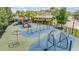 Community playground featuring swings, slides, and climbing structures for enjoyment at 20302 Noble Oak Pl, Tampa, FL 33647