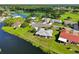 Beautiful aerial view of homes nestled along a scenic waterway with lush greenery at 2110 W View Dr, Sun City Center, FL 33573