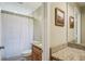 Bathroom features granite countertop and shower-tub combination at 2110 W View Dr, Sun City Center, FL 33573