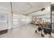 Spacious garage with storage, work area, and ample room for vehicles and projects at 2110 W View Dr, Sun City Center, FL 33573