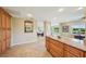 Open kitchen design with granite countertops and views to the living spaces at 2110 W View Dr, Sun City Center, FL 33573