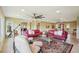 A spacious living room showcases a large rug, stylish sofas, and plenty of natural light at 2110 W View Dr, Sun City Center, FL 33573
