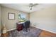 Comfortable office space offering hardwood floors, ceiling fan, and natural light at 2110 W View Dr, Sun City Center, FL 33573