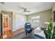 Office showcasing hardwood floors, ceiling fan, and natural light at 2110 W View Dr, Sun City Center, FL 33573