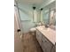 Bathroom features a shower, vanity, and toilet at 225 Country Club Dr # 1506, Largo, FL 33771