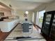 Dining area with access to a balcony and lovely views, perfect for relaxing meals at 225 Country Club Dr # 1506, Largo, FL 33771