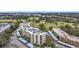 A multi-story condo building offering golf course views with covered parking at 225 Country Club Dr # 1506, Largo, FL 33771