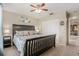 This cozy bedroom boasts a ceiling fan and a closet with plenty of storage space at 2270 Spruce Ln # B, Palm Harbor, FL 34684