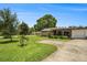 Charming single-story home with well-manicured lawn and mature landscaping in a quiet neighborhood at 2270 Spruce Ln # B, Palm Harbor, FL 34684