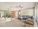 Spacious living room seamlessly connected to the dining area, with plenty of natural light at 2270 Spruce Ln # B, Palm Harbor, FL 34684