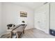 Well-lit office featuring a modern desk, chair, and neutral decor, creating a functional workspace at 26835 Juniper Bay Dr, Wesley Chapel, FL 33544