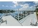 Long white dock and marina provides deep water access and gorgeous views of the intercoastal waterway at 31 Island Way # 406, Clearwater Beach, FL 33767