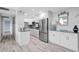 Beautifully updated kitchen with stainless steel appliances and ample counter space at 31 Island Way # 406, Clearwater Beach, FL 33767