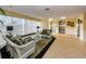 Inviting lobby featuring elegant seating, tiled floors, and easy access to the building's elevators at 31 Island Way # 406, Clearwater Beach, FL 33767
