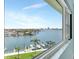 Water view from window with boats docked in front of houses at 31 Island Way # 406, Clearwater Beach, FL 33767