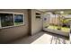 A view of the property's screened-in patio, perfect for enjoying the outdoors without the pests at 3150 Beacon Square Dr, Holiday, FL 34691