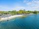 Picturesque view of the community beach, showcasing lake access and a convenient boat launch at 3325 Schefflera Rd, Tampa, FL 33618