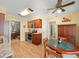 Open-concept kitchen with stylish cabinets, stainless appliances, and ample counter space at 3325 Schefflera Rd, Tampa, FL 33618