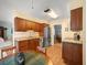 Well-lit kitchen with stainless steel appliances, wooden cabinets, and breakfast area at 3325 Schefflera Rd, Tampa, FL 33618