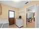 Laundry room with access to the backyard and eat-in dining area at 3325 Schefflera Rd, Tampa, FL 33618