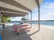 Covered pavilion with picnic tables, offering a pleasant gathering space near the beach at 3325 Schefflera Rd, Tampa, FL 33618